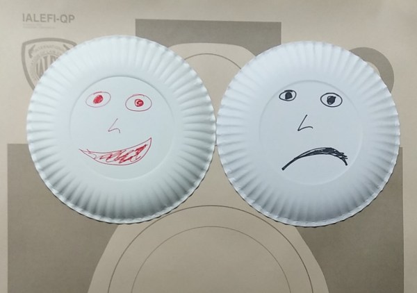 drawn faces on silhouette